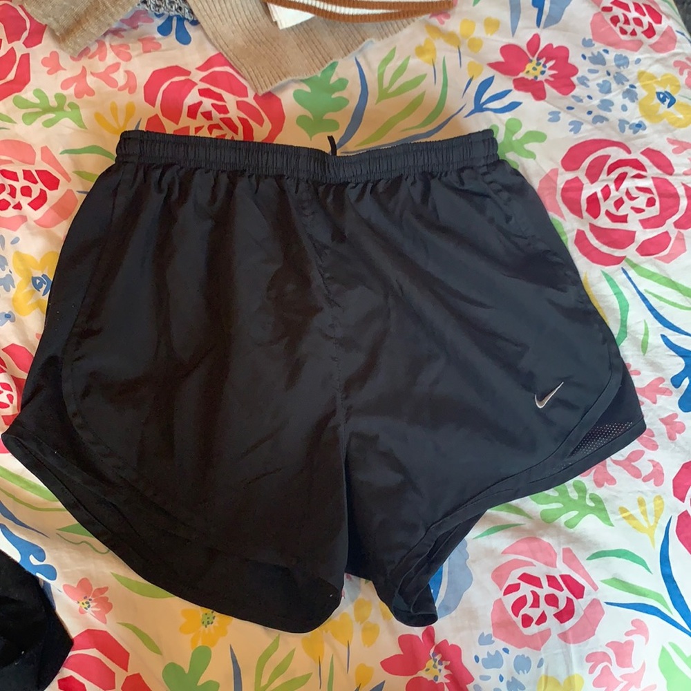Black Nike running shorts